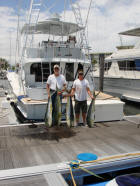 Earl Stewart catches a bunch of dolphins